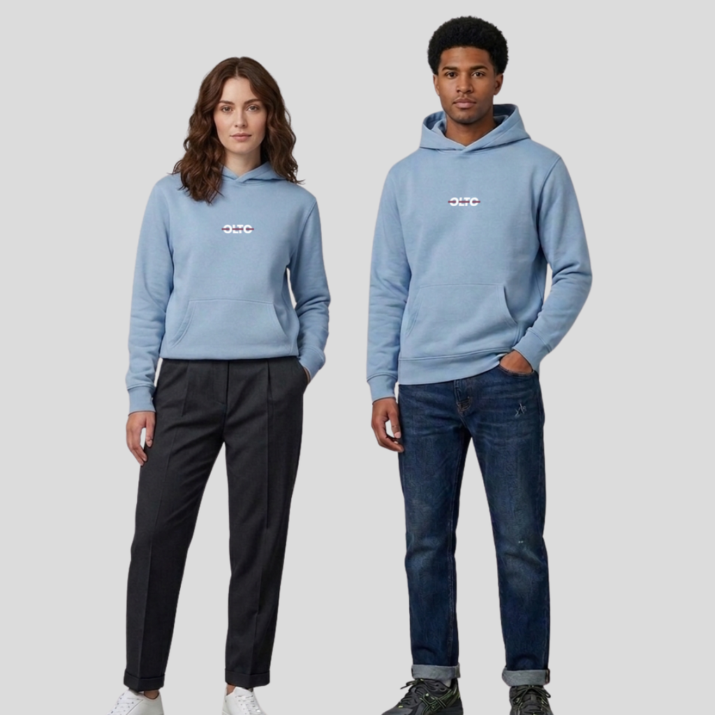 Male and female models wearing the OLTO Relaxed Hoodie in Carolina Blue to demonstrate the versatile unisex relaxed fit and streetwear styling.