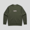 Front view flat lay of OLTO Sweater in Cypress showing the signature ColourBolt chest logo and premium heavyweight fabric texture.