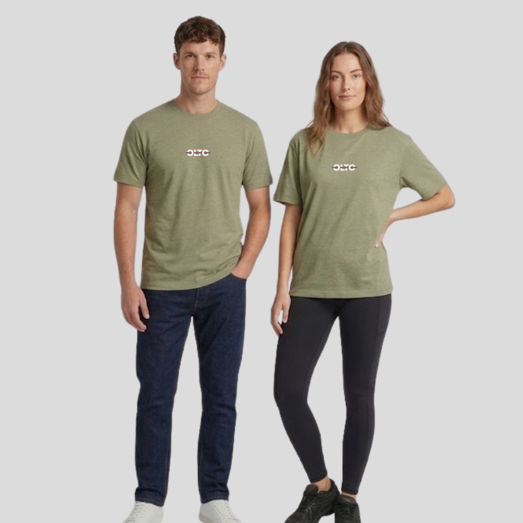 Male and female models wearing the OLTO Relaxed T-Shirt in Eucalyptus to demonstrate the versatile unisex relaxed fit and streetwear styling.