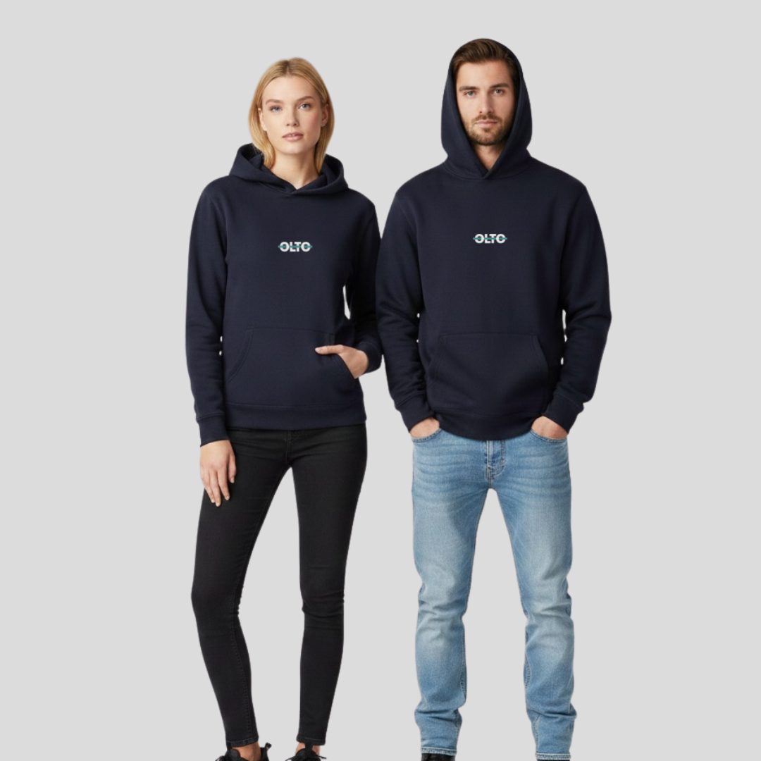 Male and female models wearing the OLTO Relaxed Hoodie in Ink Blue to demonstrate the versatile unisex relaxed fit and streetwear styling.