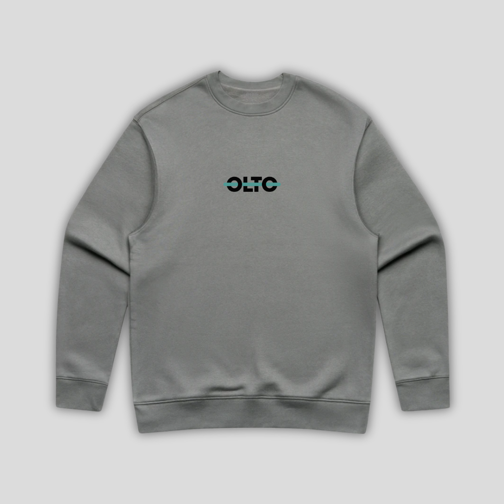Front view flat lay of OLTO Sweater in Shadow showing the signature ColourBolt chest logo and premium heavyweight fabric texture.