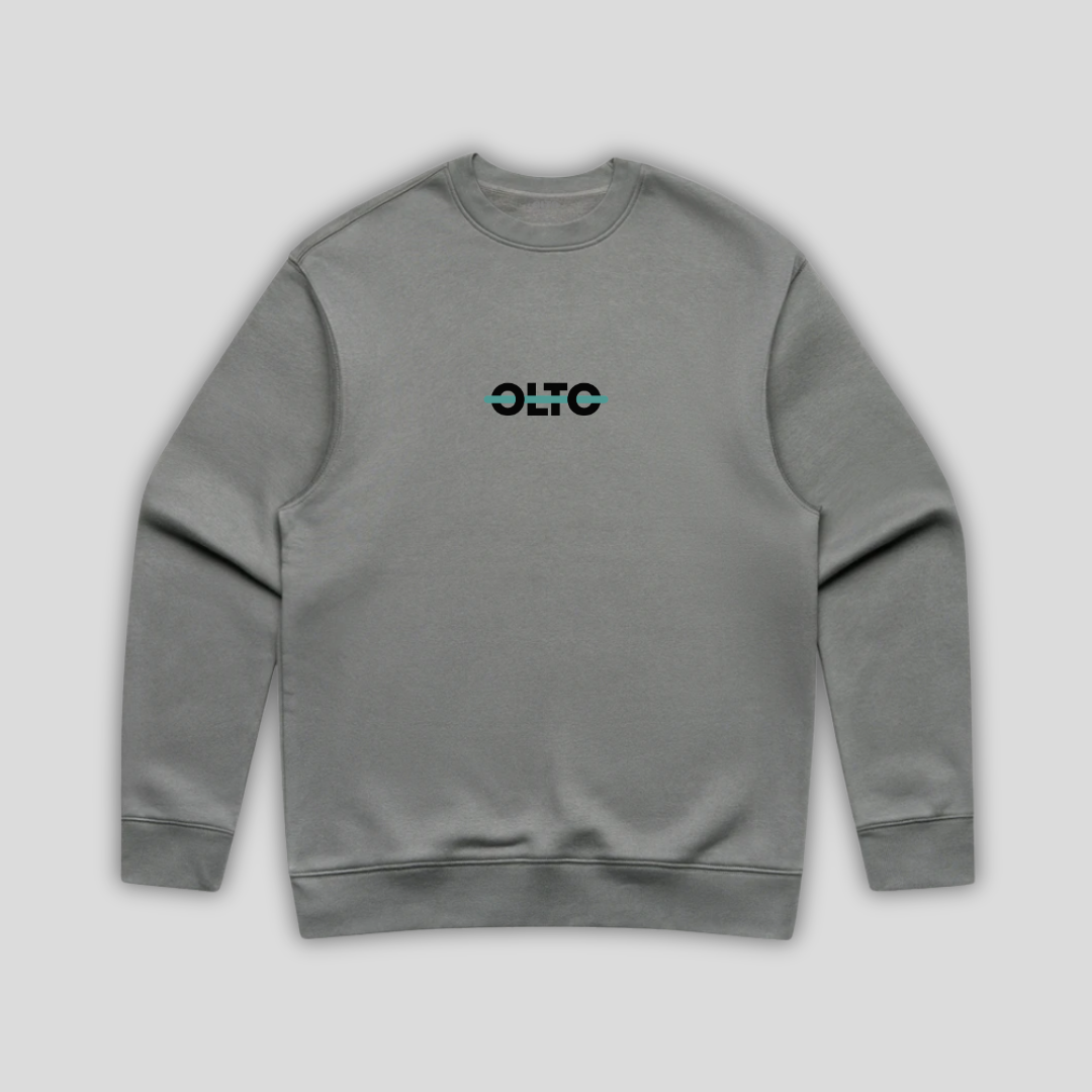 Front view flat lay of OLTO Sweater in Shadow showing the signature ColourBolt chest logo and premium heavyweight fabric texture.