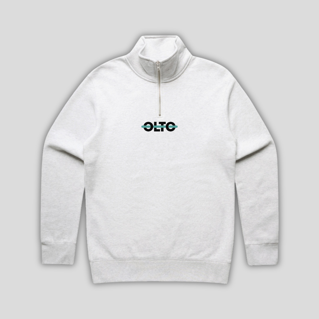 Front view flat lay of OLTO Half Zip in White Heather showing the signature ColourBolt chest logo and premium heavyweight fabric texture.